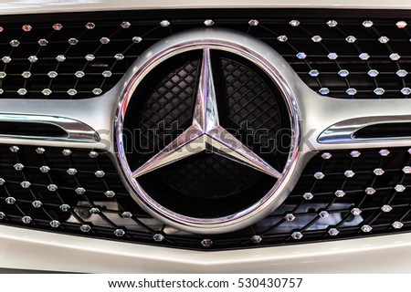 WARSAW, POLAND - NOVEMBER 21, 2016: Mercedes Benz logo close up. Mercedes-Benz is a German automobile manufacturer. The brand is used for luxury automobiles, buses, coaches and trucks.