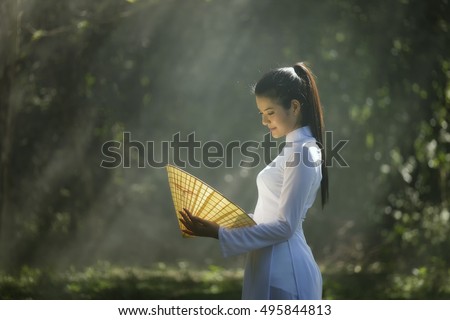 Portrait of Thai girls with Ao-Dai, Vietnam traditional dress.