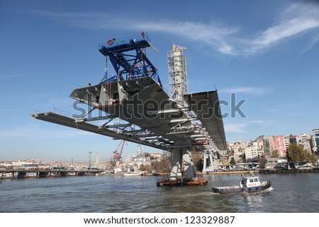 ISTANBUL, TURKEY-DECEMBER 26 : The ongoing construction of the Golden Horn Metro Bridge has been criticized for breaking city's skyline on December 26, 2012 in Istanbul,Turkey.