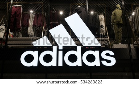 PARIS, FRANCE - CIRCA NOVEMBER 2016: Adidas store. Adidas Is a German multinational corporation that designs and manufactures sports clothing and accessories.