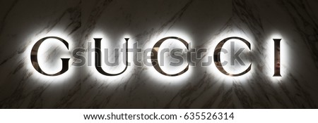 TOKYO, JAPAN - CIRCA MARCH, 2017: Gucci neon sign inside shopping mall.