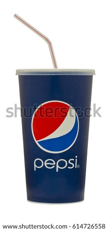 London, England - October 22, 2011: Cup of Pepsi Cola with Straw, The Pepsi Brand is owned by PepsiCo Inc.