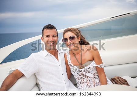https://thumb1.shutterstock.com/display_pic_with_logo/4425/162344993/stock-photo-picture-of-happy-young-couple-on-their-yacht-162344993.jpg