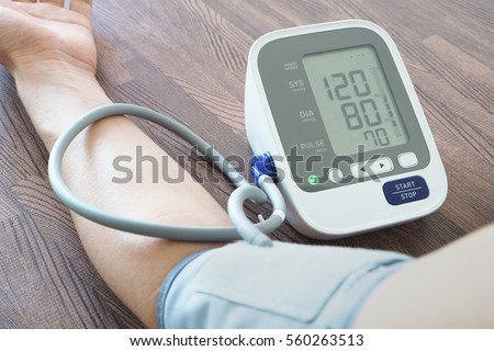 Health care for men with rhythm and blood pressure monitors stove. . Health concept