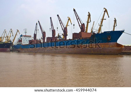 Cargo ships in a port of Hai Phong, Vietnam. Hai Phong port is one of the two biggest ports in Vietnam.