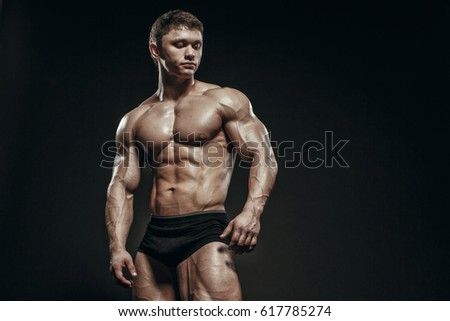 muscular athletic bodybuilder fitness model posing stock photo muscular athletic bodybuilder fitness model posing stock photo, Muscles