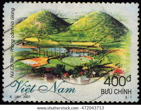 SINGAPORE ?? AUGUST 22, 2016: A stamp printed in Viet Nam shows Co Tien Mountain - Ha Giang Province, circa 2001