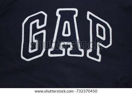 MOSCOW, RUSSIA - OCTOBER 9, 2017: GAP Store Dark Blue Hoodie with Logo. Gap is American worldwide clothing and accessories retailer, founded in 1969. Corporate famous brand on casual sweatshirt.