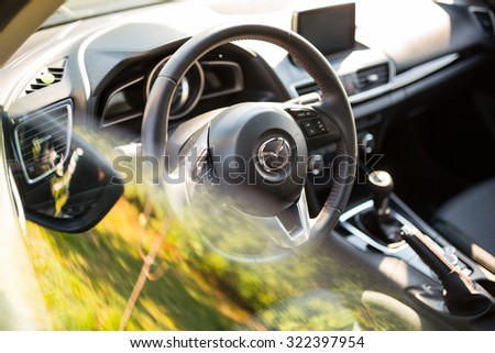 POLAND - AUGUST 9, 2015: Interior of new Mazda 3 captured with low depth of field technique. Mazda 3 is a popular compact car manufactured in Japan by the Mazda Motor Corporation.