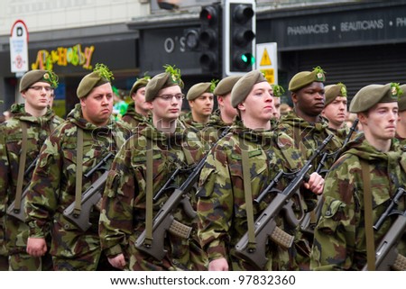 stock-photo-limerick-ireland-march-unidentified-soldiers-of-irish-army-participate-in-a-parade-for-st-97832360.jpg