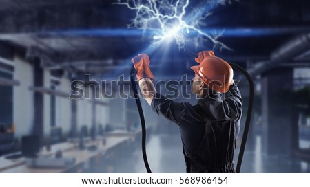 Electrician connecting cable . Mixed media