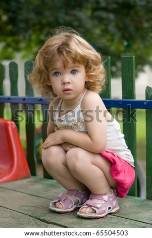 Girl Crouching Stock Photo 65504503 - Shutterstock