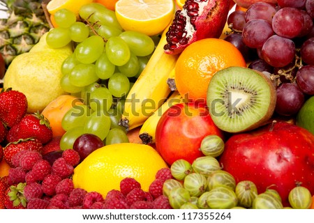 Huge group of fresh vegetables and fruits isolated on a white background. Shot in a studio
