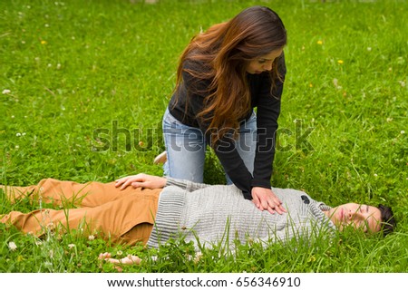 Beautiful Woman Giving First Aid Handsome Stock Photo (Royalty Free ...