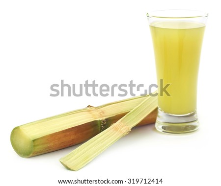 Piece of sugarcane juice in a glass