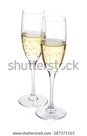 Two champagne glasses. Isolated on white background