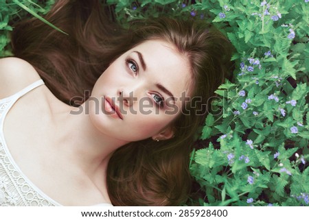 http://thumb1.shutterstock.com/display_pic_with_logo/493354/285928400/stock-photo-portrait-of-a-beautiful-young-woman-in-summer-garden-girl-on-nature-spring-flowers-fashion-beauty-285928400.jpg