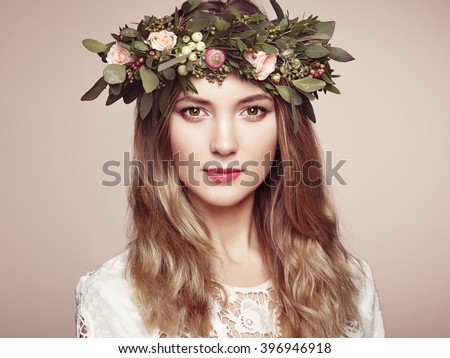 https://thumb1.shutterstock.com/display_pic_with_logo/493354/396946918/stock-photo-beautiful-blonde-woman-with-flower-wreath-on-her-head-beauty-girl-with-flowers-hairstyle-perfect-396946918.jpg