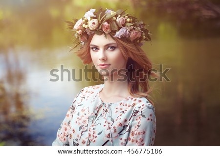 https://thumb1.shutterstock.com/display_pic_with_logo/493354/456775186/stock-photo-beautiful-blonde-woman-with-flower-wreath-on-her-head-beauty-girl-with-flowers-hairstyle-girl-in-456775186.jpg