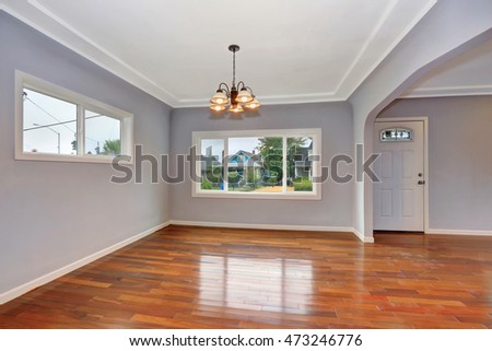 Empty Old House Interior Entryway With Hardwood Floor And Lavender Walls Northwest USA Empty Old House Interior Entryway With Hardwood Floor And Lavender Walls Northwest USA