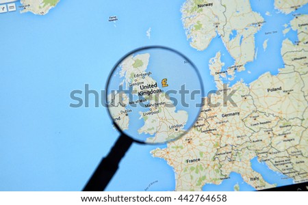 MONTREAL, CANADA - FEBRUARY, 2016 - London on Google Maps app under magnifying glass. London is the Capital og UK.