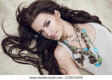 http://thumb1.shutterstock.com/display_pic_with_logo/516772/123053698/stock-photo-a-beautiful-brunette-girl-with-amazing-eyes-123053698.jpg