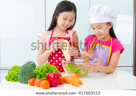 Asian kids enjoyed cooking