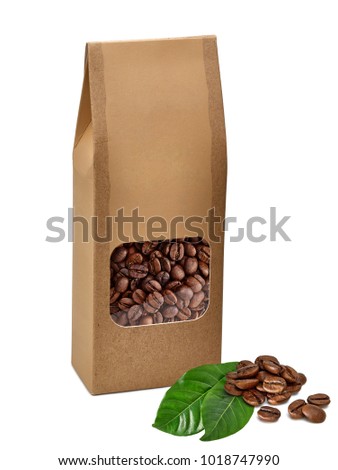 Coffee Beans In Kraft Package With Die Cut Window On White Background Coffee Beans In Kraft Package With Die Cut Window On White Background