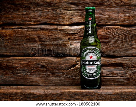 Heineken Lager Beer bottle on wooden background. TURKEY - March 6, 2014