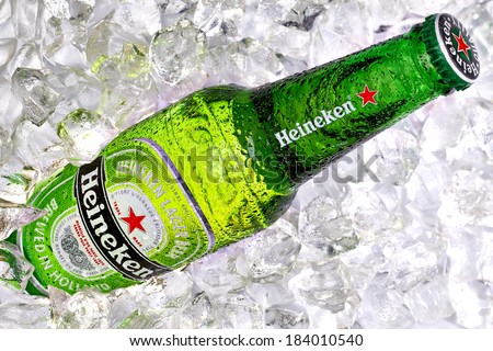 TURKEY - MARCH 26, 2014 Bottle of Heineken Lager Beer on crushed ice background. Heineken is a brand of lager beer brewed in Holland.