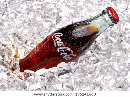 ANKARA - TURKEY - June 1, 2014 250ml Classic Coca-Cola bottle with ice. Coca-Cola Company is the most popular market leader in Turkey.