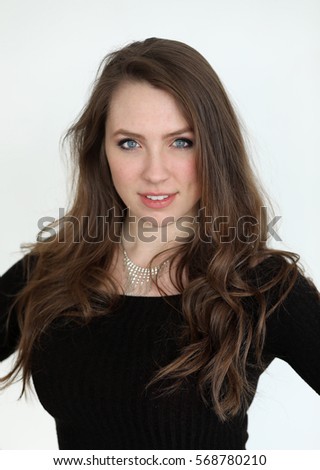 https://thumb1.shutterstock.com/display_pic_with_logo/52379/568780210/stock-photo-photo-of-a-very-attractive-woman-with-brown-hair-and-blue-eyes-shot-against-a-white-wall-568780210.jpg