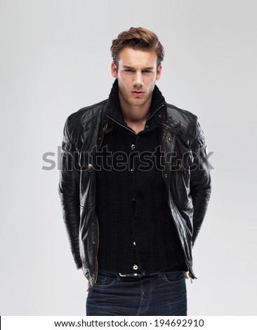 Fashion man, Handsome serious beauty male model portrait wear leather ...