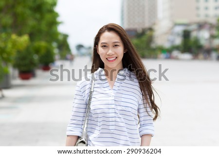 https://thumb1.shutterstock.com/display_pic_with_logo/534712/290936204/stock-photo-asian-woman-face-smile-walking-on-city-street-summer-day-290936204.jpg