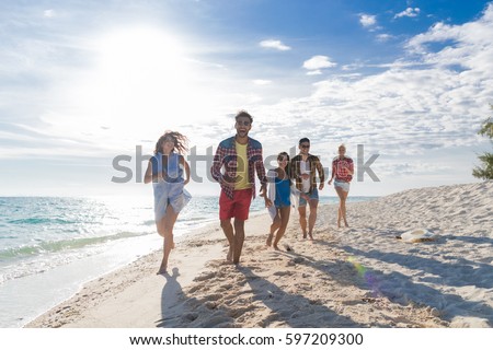 [Image: stock-photo-young-people-group-on-beach-...209300.jpg]
