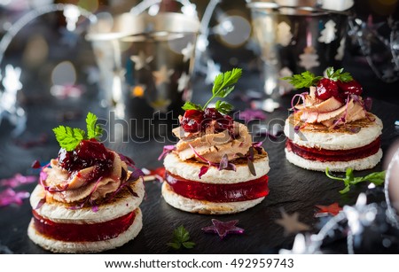 Festive appetizer with foie gras, cranberry chutney and jelly