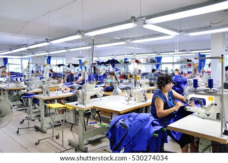 GUKOVO, RUSSIA - SEPTEMBER, 2016: Workers work in a garment factory.