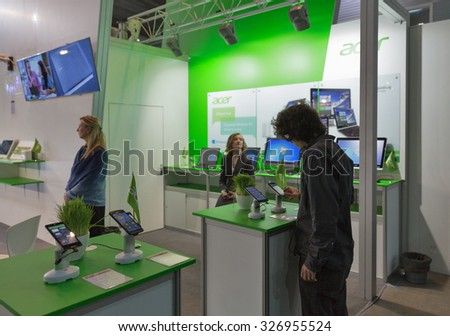 KIEV, UKRAINE - OCTOBER 11, 2015: People visit Acer, a Taiwan based international computer company booth during CEE 2015, the largest electronics trade show of Ukraine in ExpoPlaza Exhibition Center.