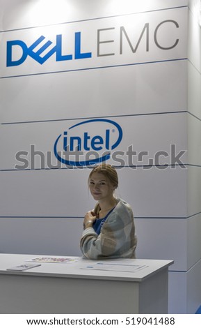 KIEV, UKRAINE - OCTOBER 09, 2016: Beautiful girl presenter works on Dell Emc, American data storage company booth during CEE 2016, the largest electronics trade show of Ukraine in KyivExpoPlaza EC.