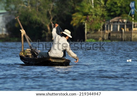 CAI RANG - FEB 17: Unidentified Vietnamese fisherman fishing in the Mekong delta. After the Ganges delta, Mekong delta is the second biggest delta in the world. On Feb 17, 2013 in Cai Rang, Vietnam