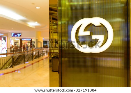 KUALA LUMPUR, MALAYSIA - APRIL 23, 2014: Gicci logo on the wall. Gucci is an Italian fashion and leather goods brand, part of the Gucci Group