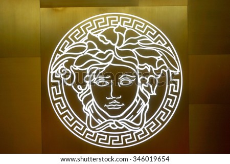 SINGAPORE - NOVEMBER 08, 2015: close us shot of Versace logo on the wall. Versace, is an Italian fashion company and trade name founded by Gianni Versace in 1978