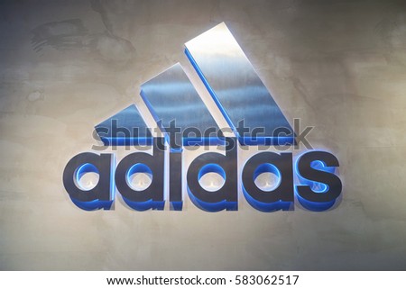 HONG KONG - CIRCA NOVEMBER, 2016: Adidas sign at a store in Hong Kong. Adidas AG is a German multinational corporation that designs and manufactures shoes, clothing and accessories.