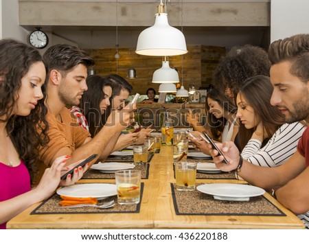 stock-photo-group-of-friends-at-a-restau