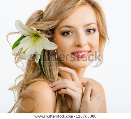 https://thumb1.shutterstock.com/display_pic_with_logo/552799/128763080/stock-photo-beautiful-smiling-woman-with-a-lily-128763080.jpg