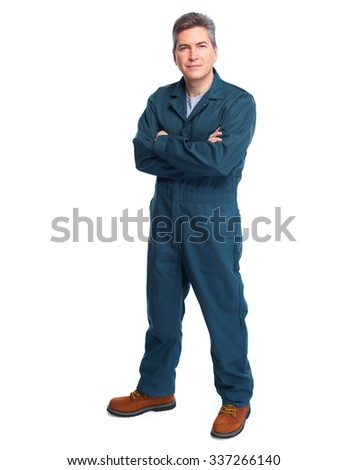 Smiling handsome plumber man. Isolated white background.