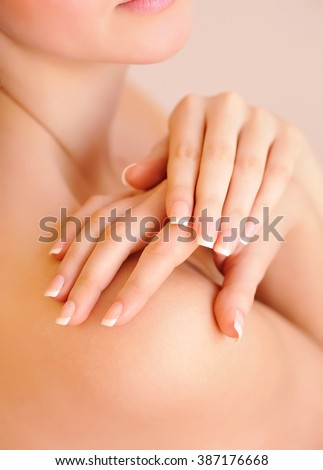 Woman hands with beautiful french manicure