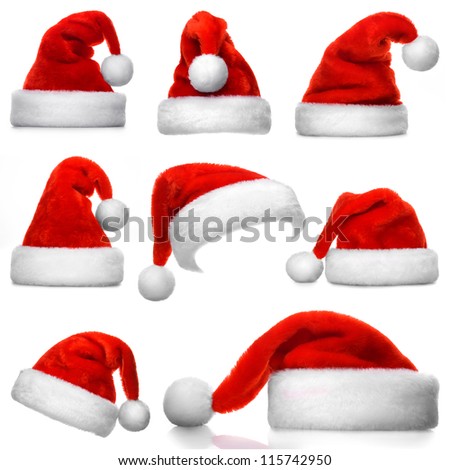 Set of red Santa Claus hats isolated on white background