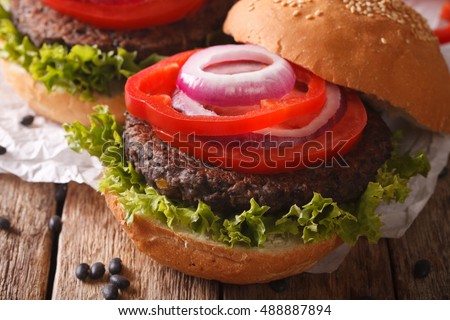 Vegetarian black bean burgers macro on the table. Horizontal
