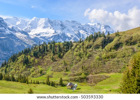 Swiss Mountain House beautiful swiss mountain valley landscape house stock photo Swiss Mountain House beautiful swiss mountain valley landscape house stock photo